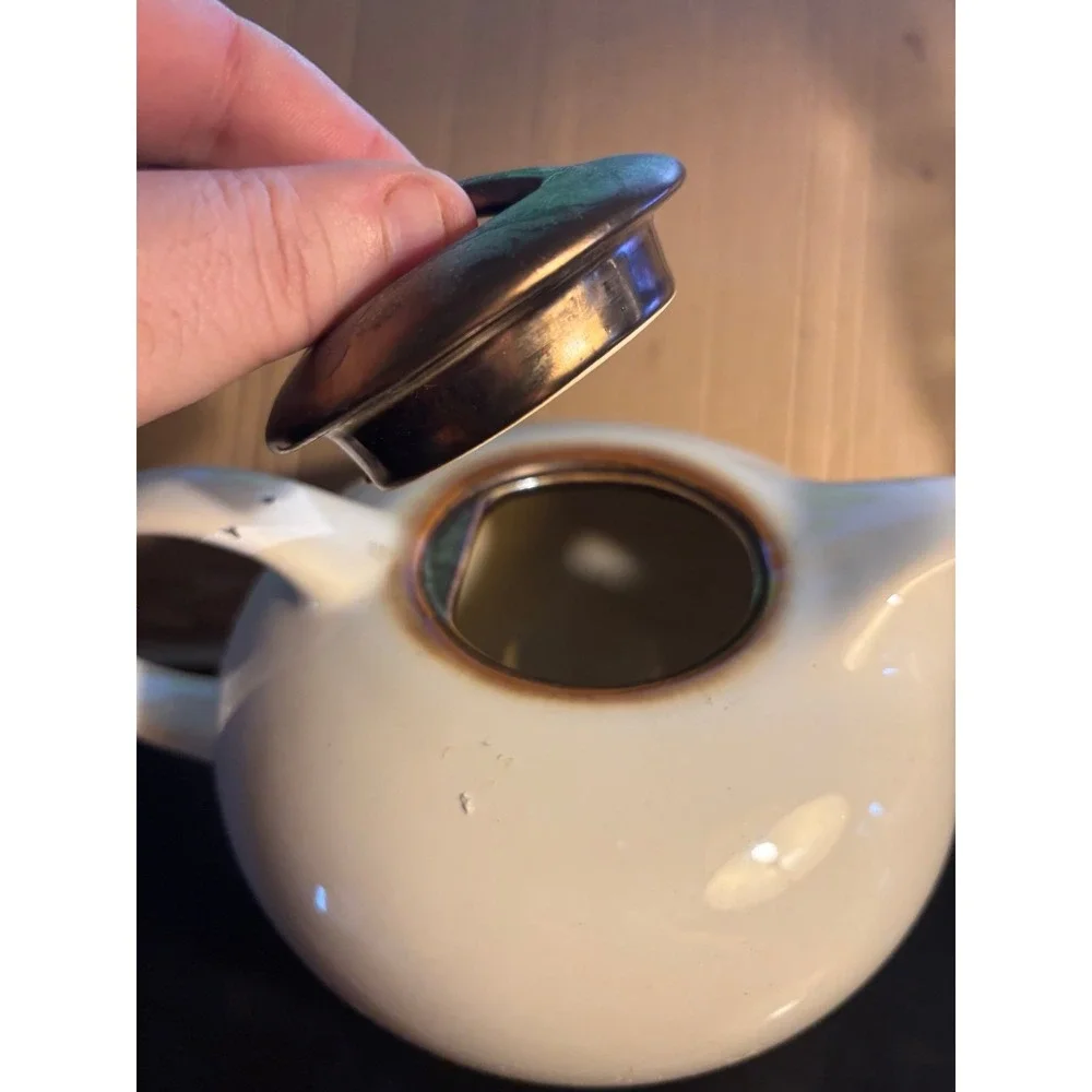 Vintage look stoneware Teapot With Bronze Colored Lid.